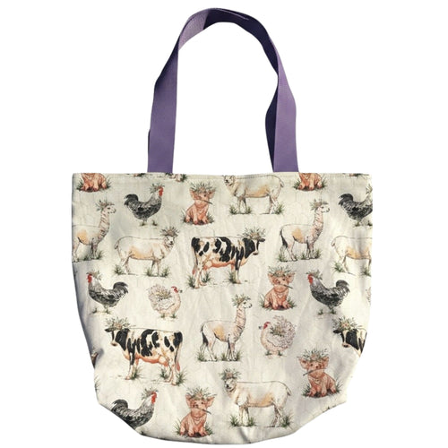 Oversized handmade canvas tote bag featuring watercolor farm animals and lavender shoulder straps