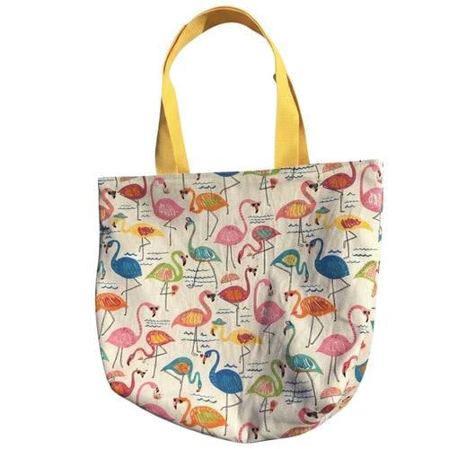 Oversized handmade flamingo canvas tote bag with colorful tropical print and yellow shoulder straps