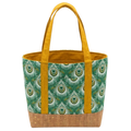 Handmade cotton tote bag with earth-toned owl pattern, forest green handles, and structured black base