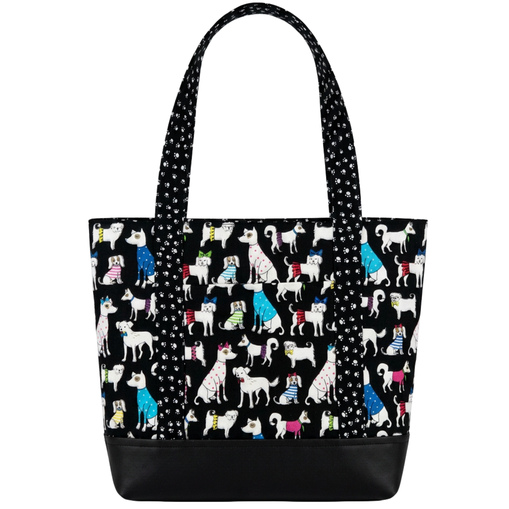 Handmade black dog print cotton tote bag with paw print handles and black base