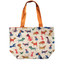 Handmade canvas tote bag featuring colorful watercolor dogs with bright orange canvas handles.