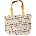 Handmade canvas tote bag featuring colorful woodland mushrooms with mustard canvas handles.