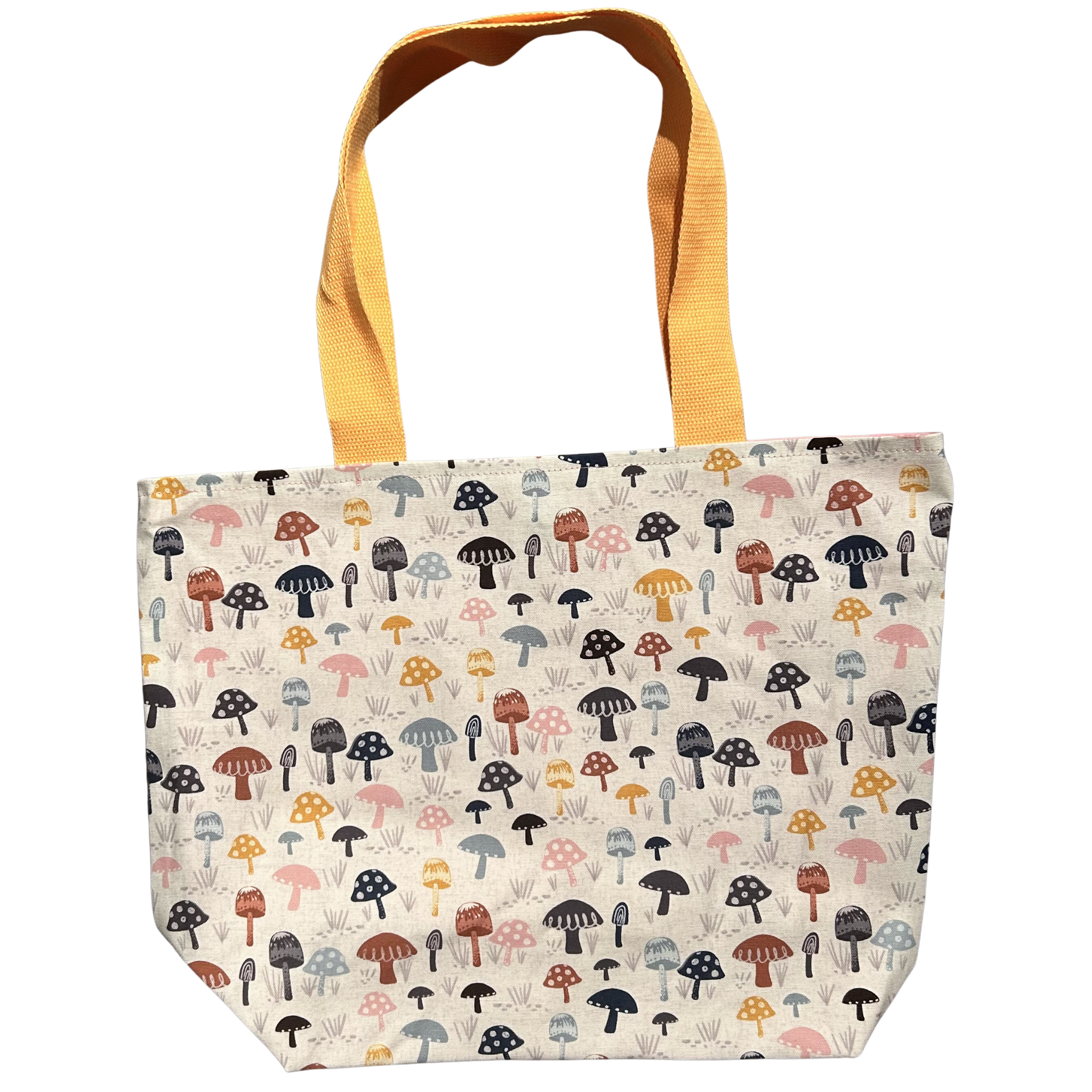 Handmade canvas tote bag featuring colorful woodland mushrooms with mustard canvas handles.