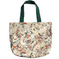 Oversized handmade floral canvas tote bag with watercolor wildflower print and dark green shoulder straps