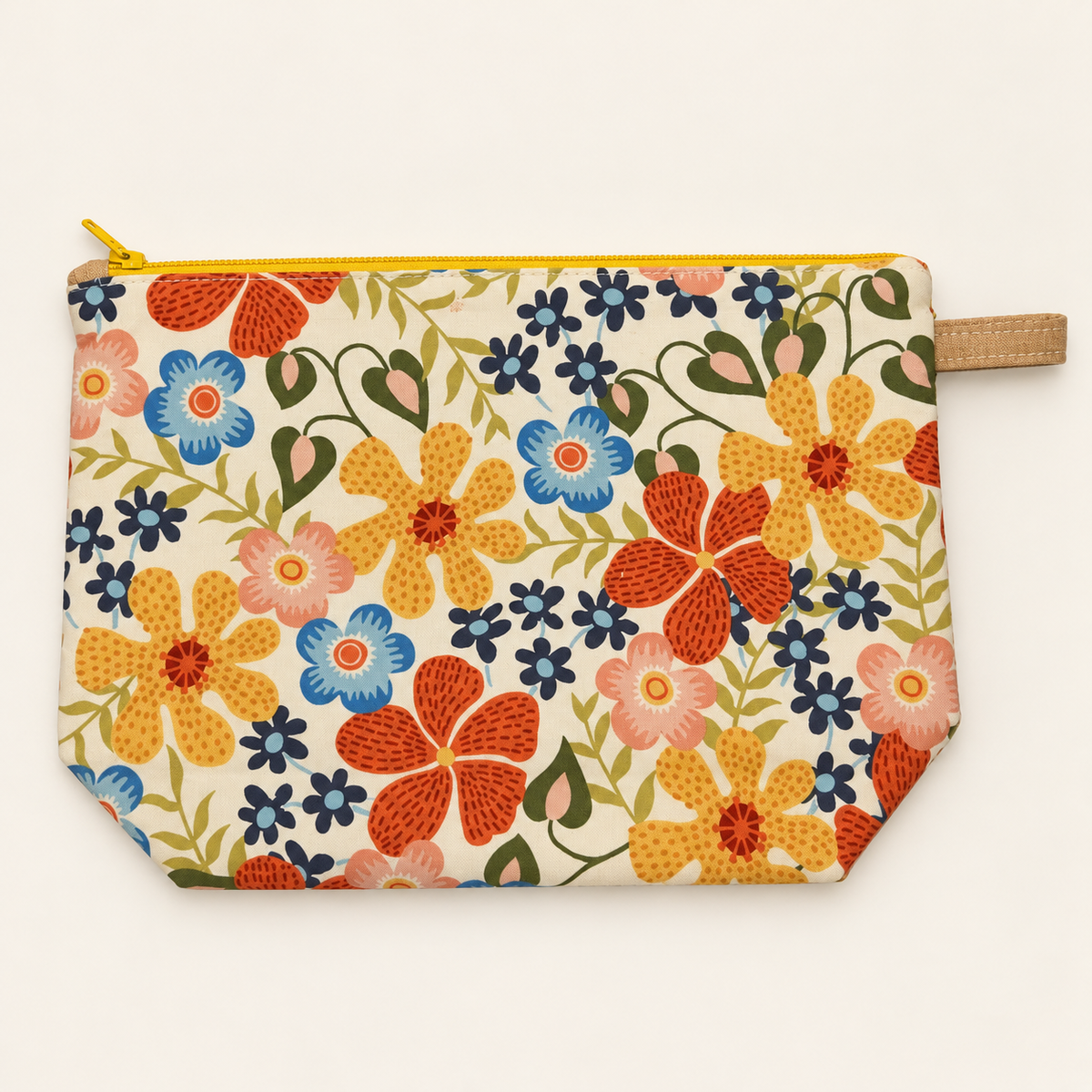 Bloom Service retro floral pouch laid flat with yellow zipper.