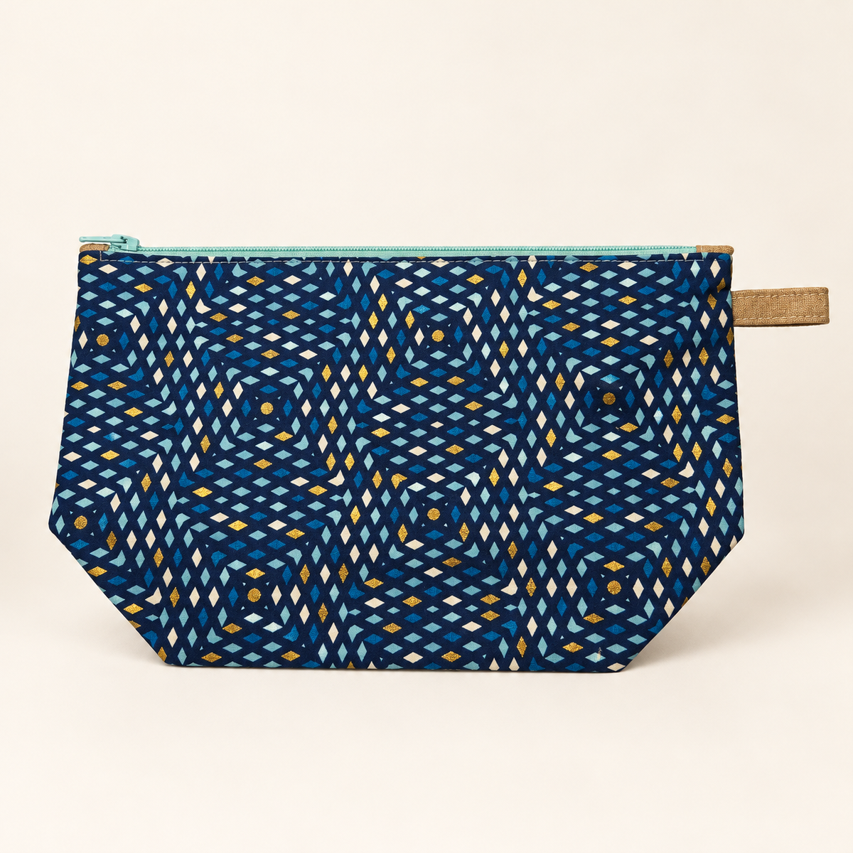 Blue by Design navy geometric cotton pouch with pale aqua zipper, flat view