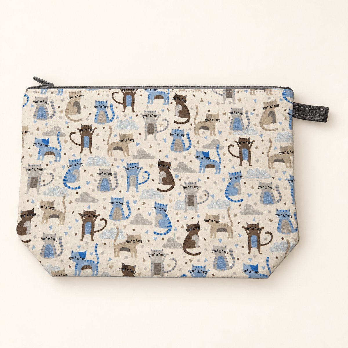 Cat's Out of the Bag cotton pouch laid flat with blue, gray and brown cats and gray zipper.