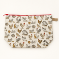 Cluck Around chicken print cotton zipper pouch laid flat with red zipper.