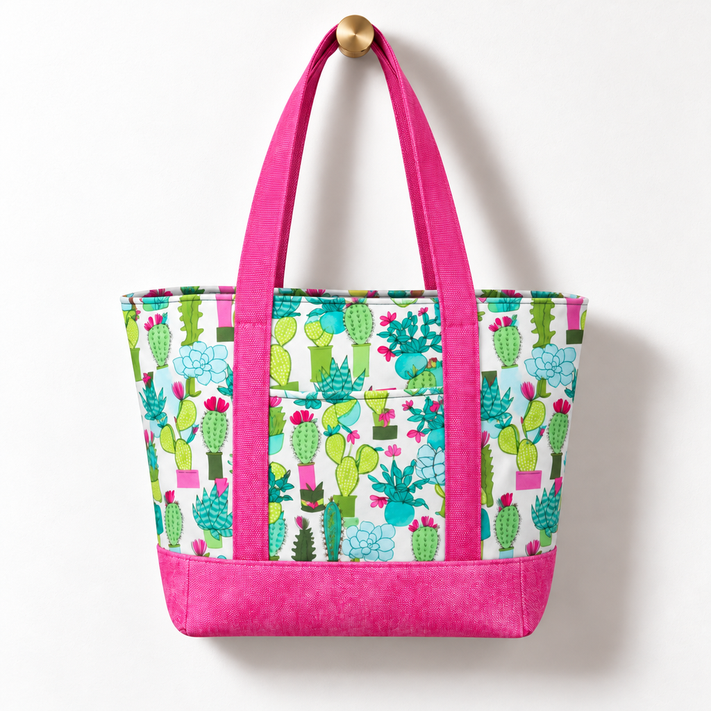 Cactus Cotton Tote Bag - Bright Pink, hanging from a gold wall knob
