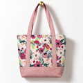Blush Garden Floral Cotton Tote Bag – Blush Pink, hanging from a gold wall knob