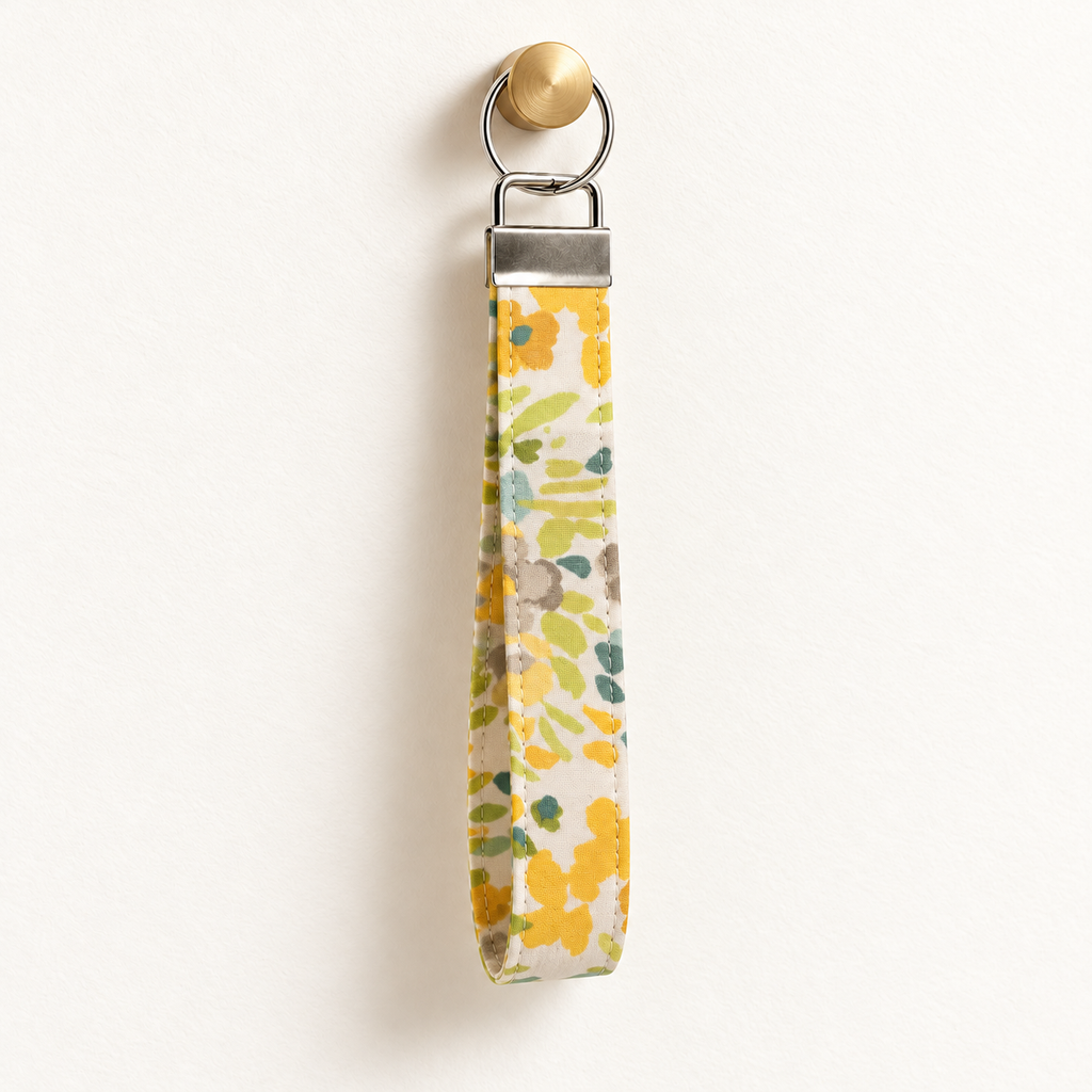 Freshly Picked – Fabric Wristlet Keychain hanging from a gold wall knob