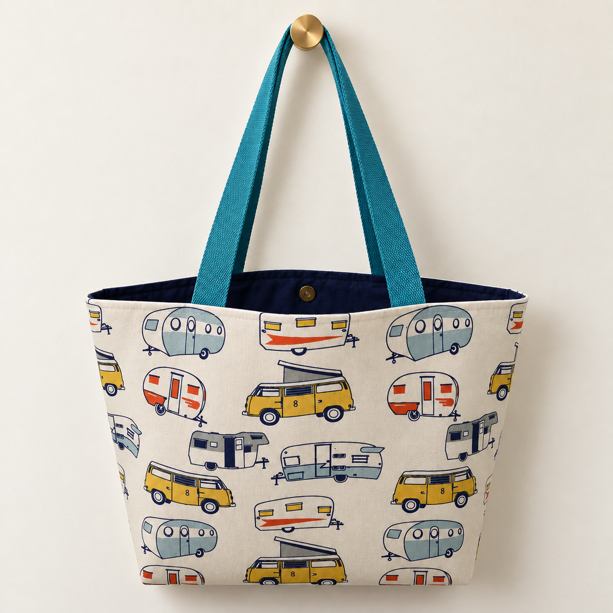 Happy Glamper Weekender Tote with navy blue lining and teal handles