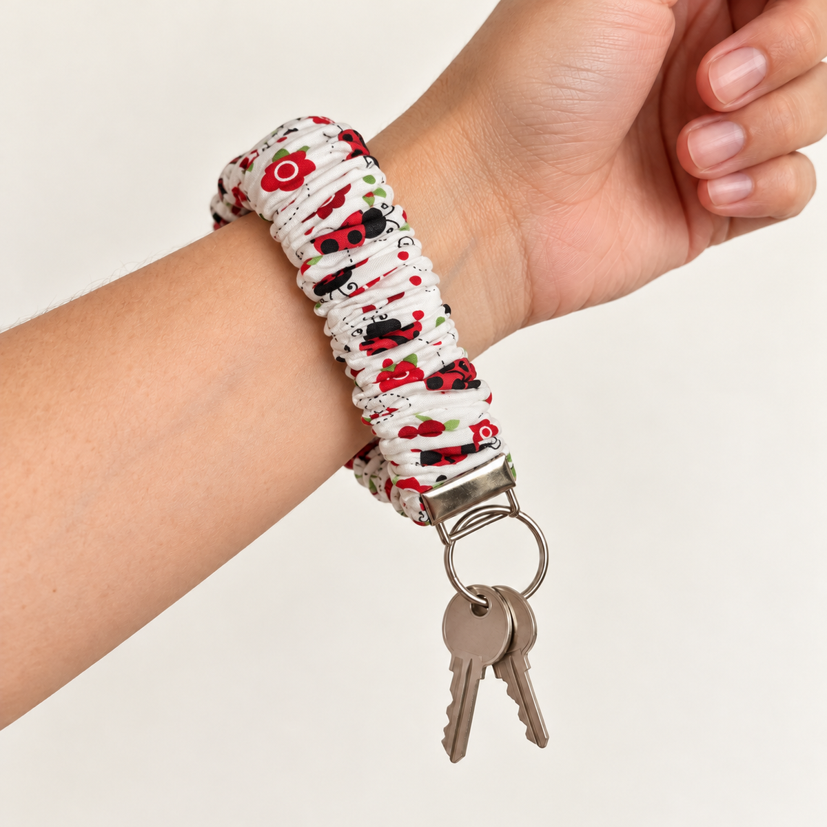 Love Bug ladybugs cotton scrunchie wristlet worn with keys