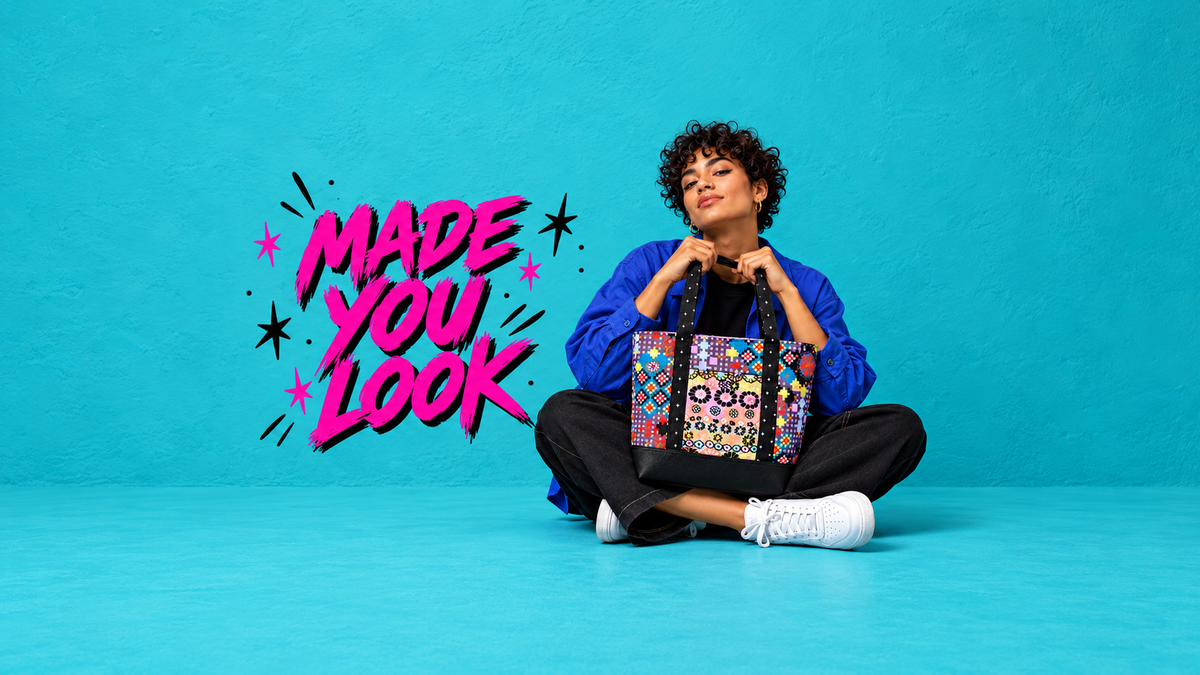 Made You Look collection hero with pink lettering and model holding a patterned tote