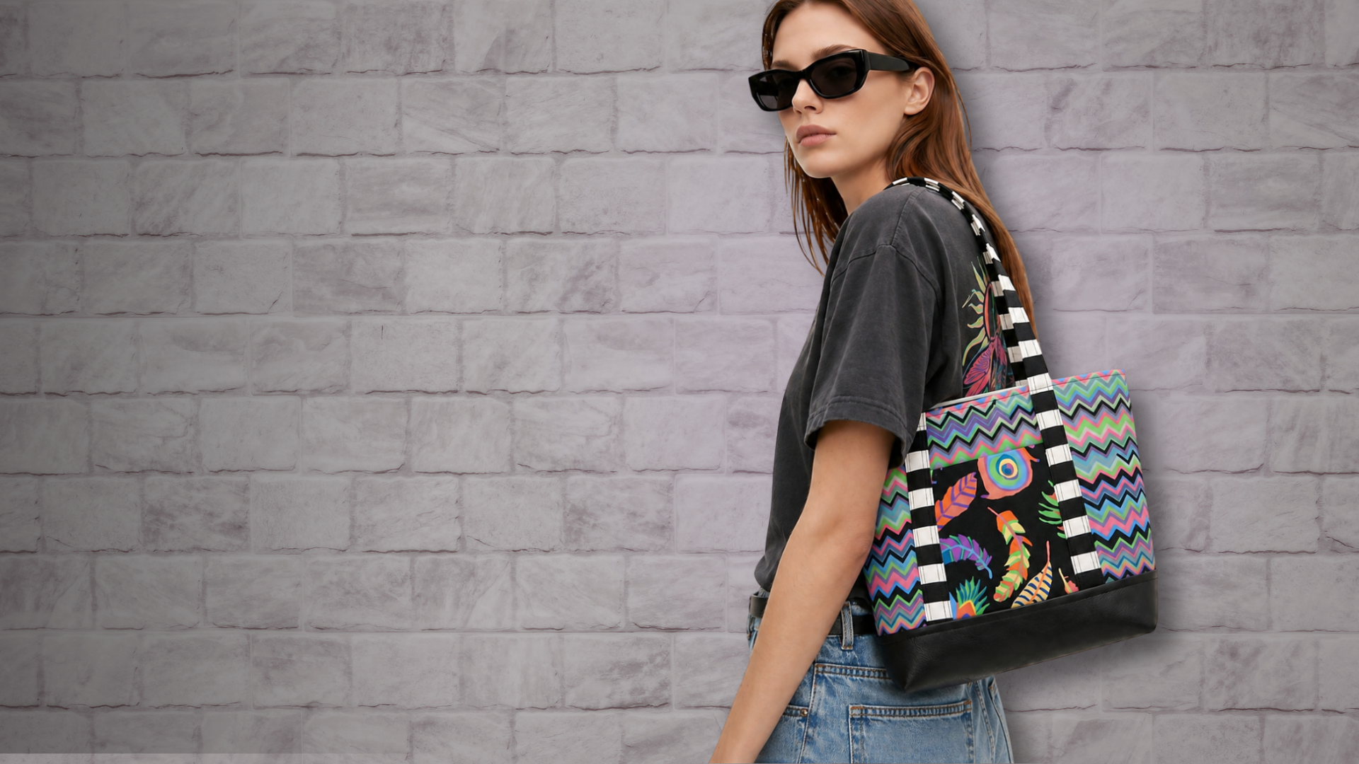 Model carrying a handmade cotton tote bag with bold chevron pattern and tropical print, everyday statement tote bag