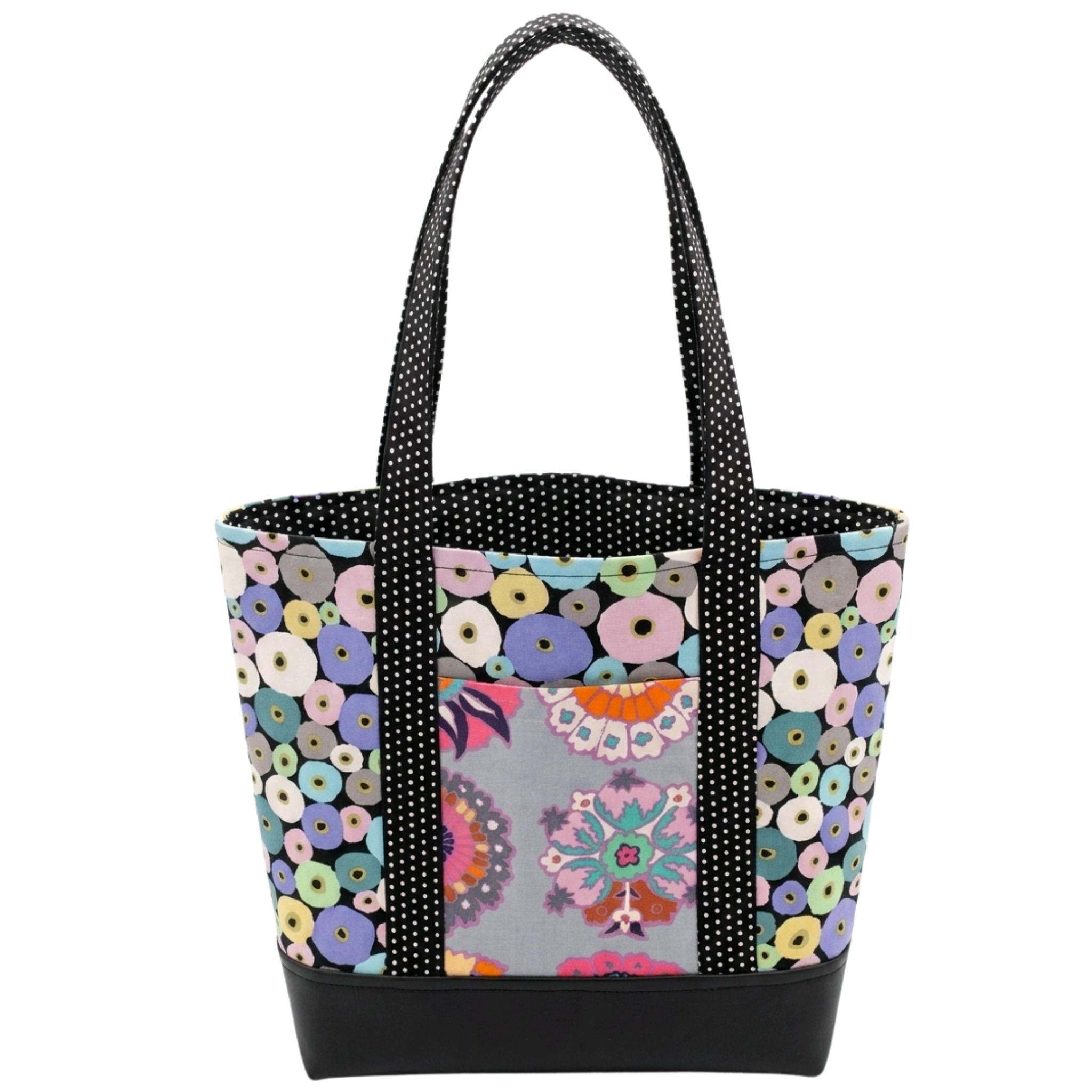 Handmade cotton tote bag with mod floral ring pattern and black and white dotted straps