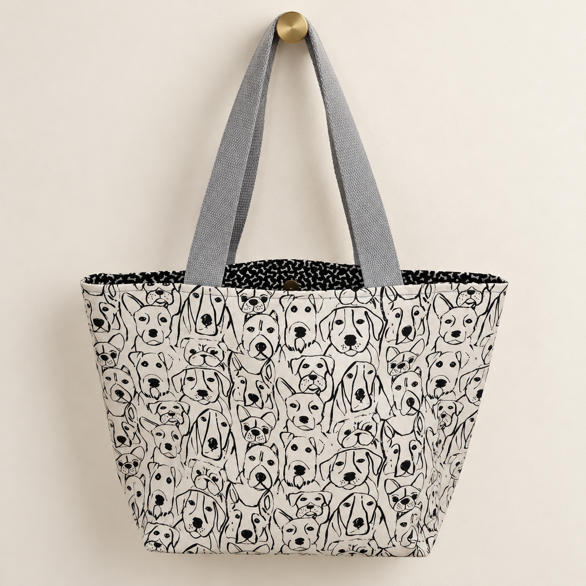 Pack Mentality Weekender Tote with light gray handles and dog-bone print lining