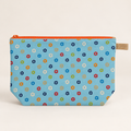 Petal Pop sky blue floral cotton pouch with orange zipper, flat view