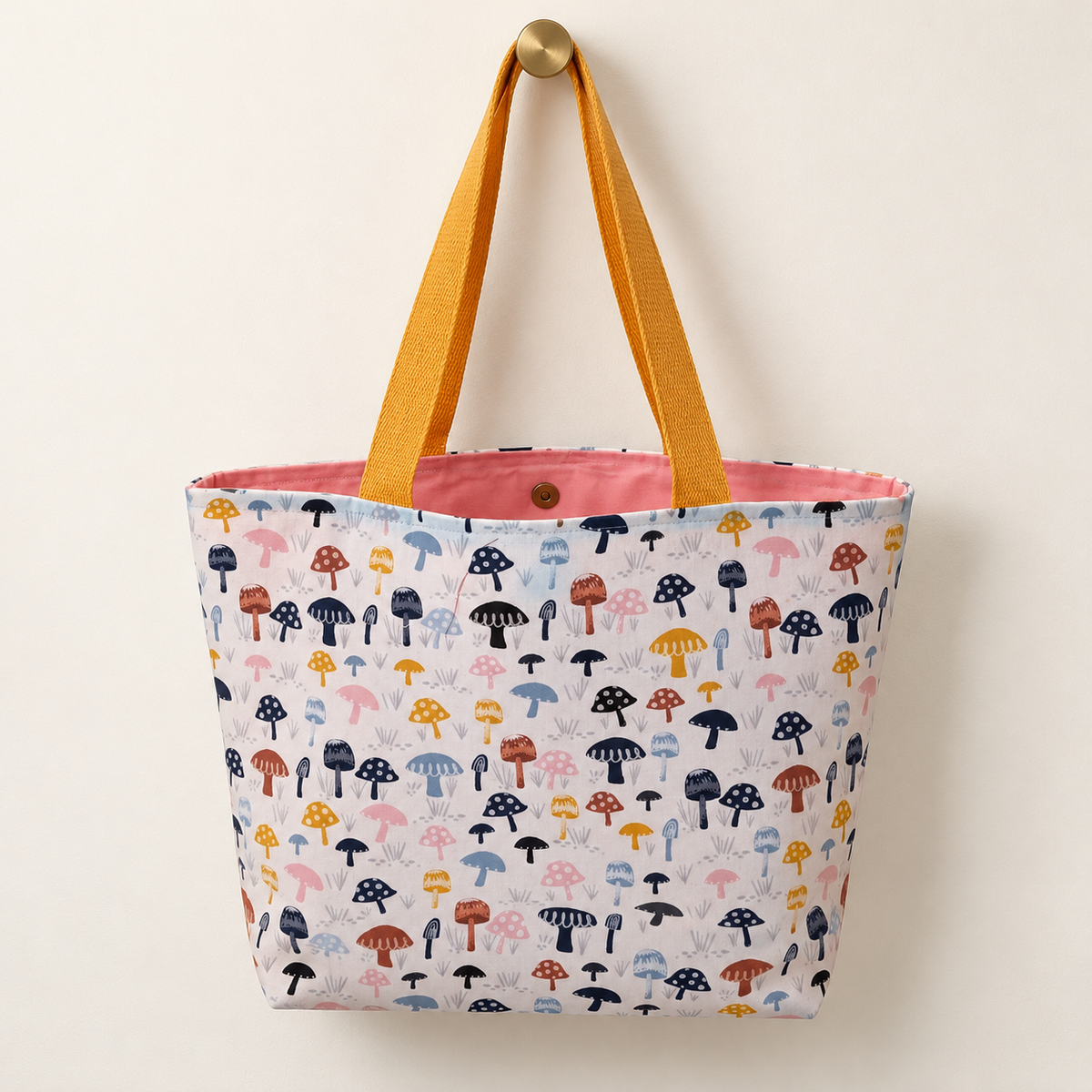 Mushroom Weekender Tote with mustard handles and pink lining