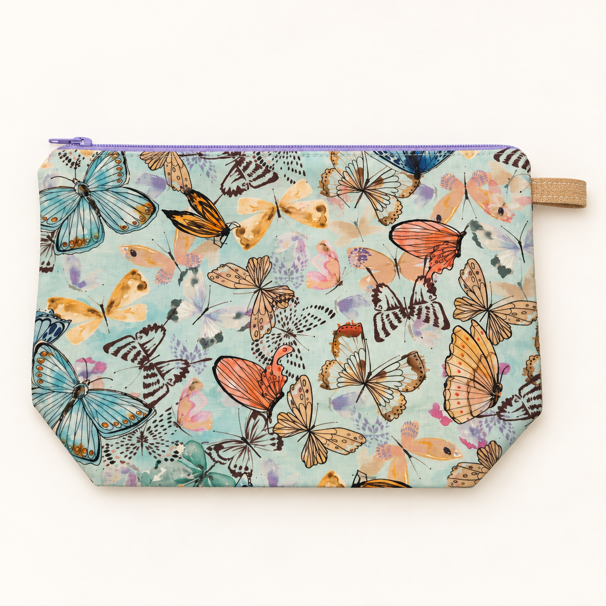 Social Butterfly pastel butterfly cotton pouch laid flat with lavender zipper.