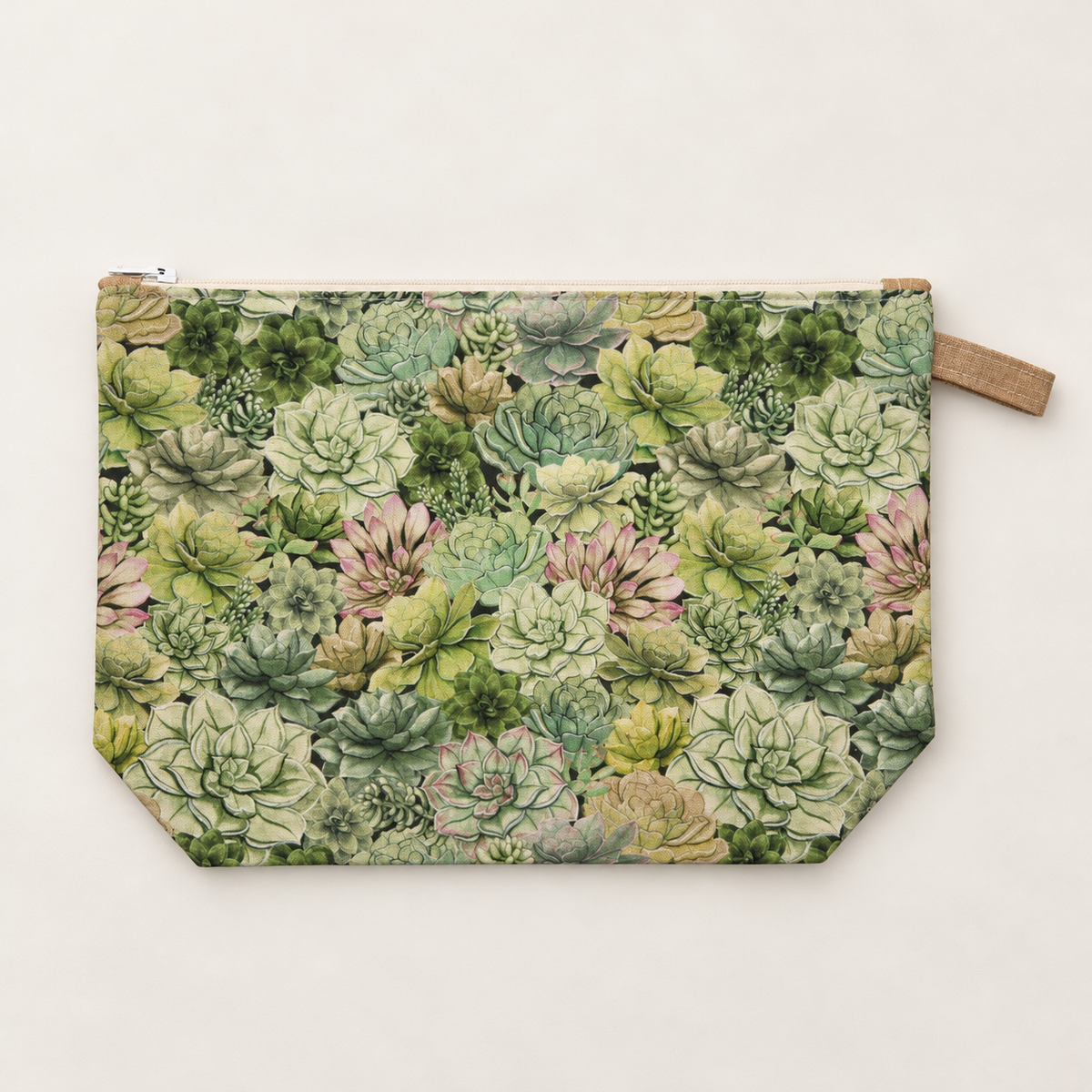 Succ It Up cotton studio zipper pouch laid flat, with green succulent print and cream zipper.
