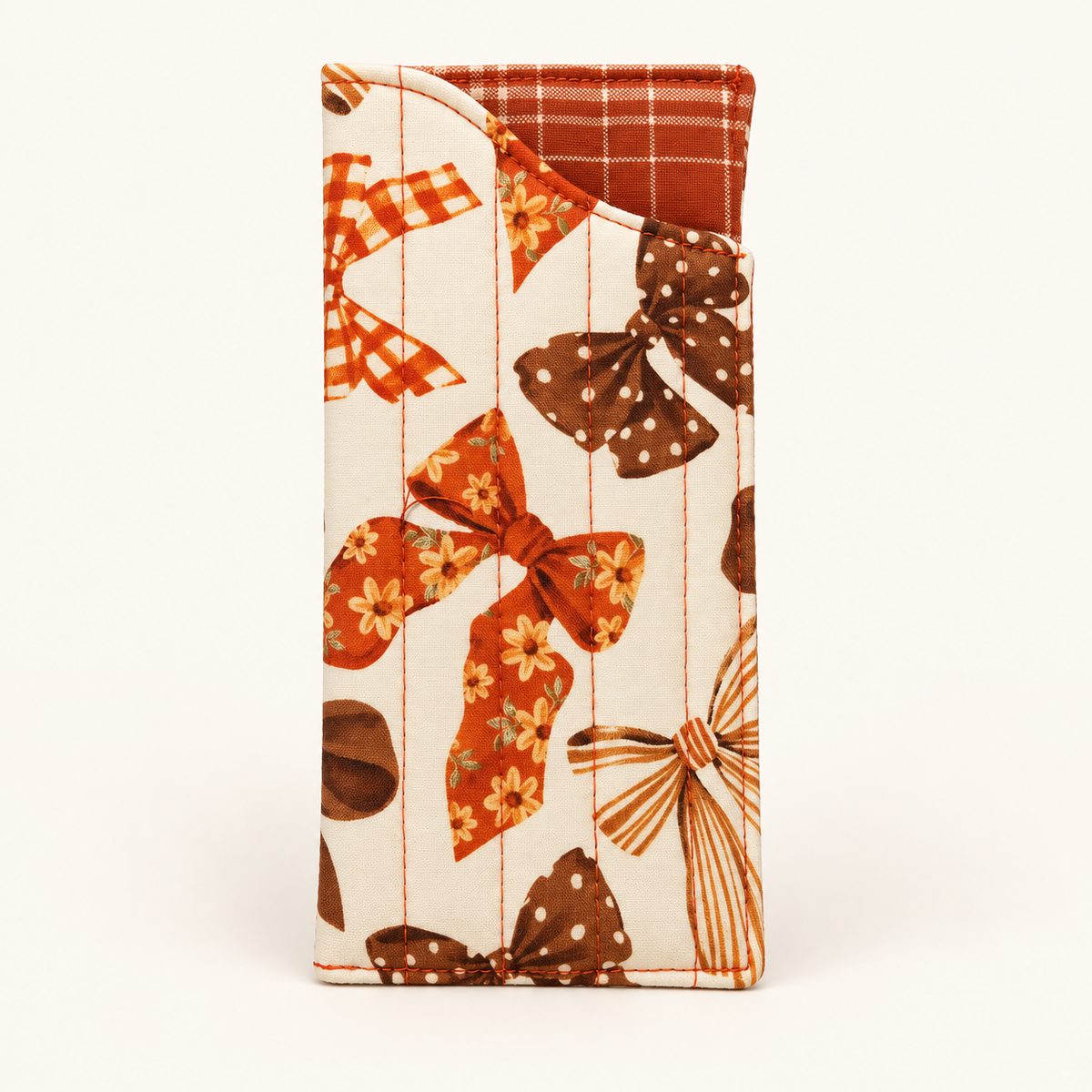 Take a Bow quilted glasses case with Rust Grid lining