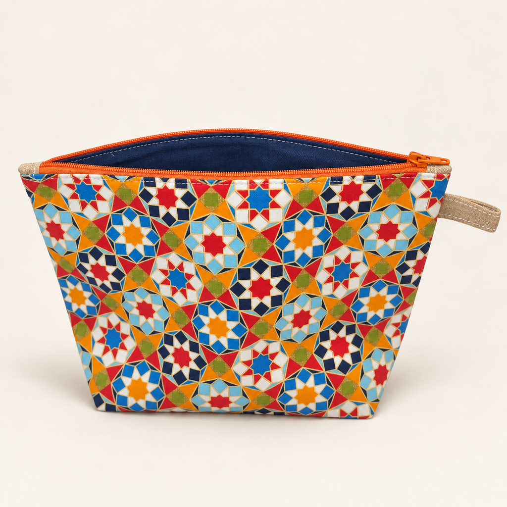 Tile Me More geometric cotton pouch with orange zipper, standing view showing navy lining